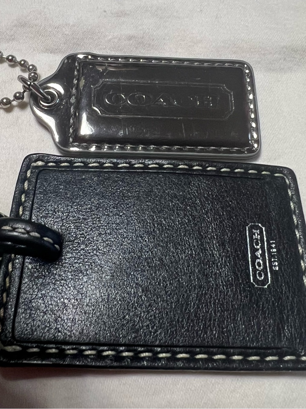 Coach Silver-Tone Embossed Rectangular Dog Tag Key Holder and luggage tag